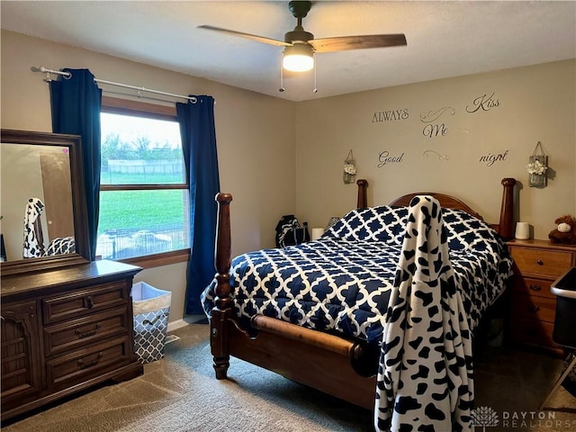 carpeted bedroom with ceiling fan