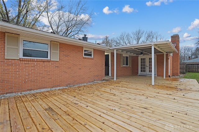 wooden deck featuring french doors