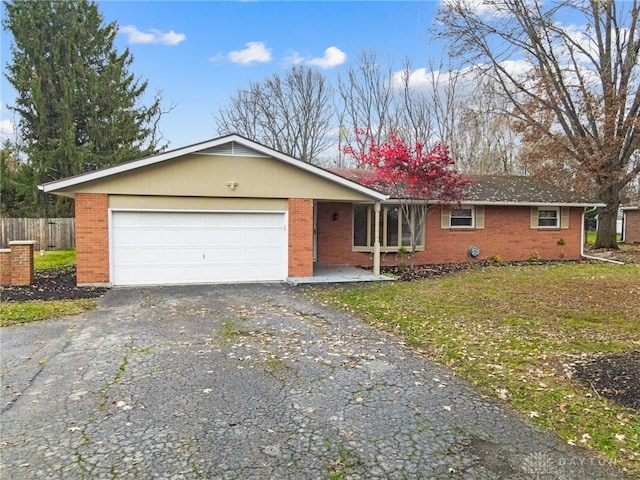 single story home with a garage