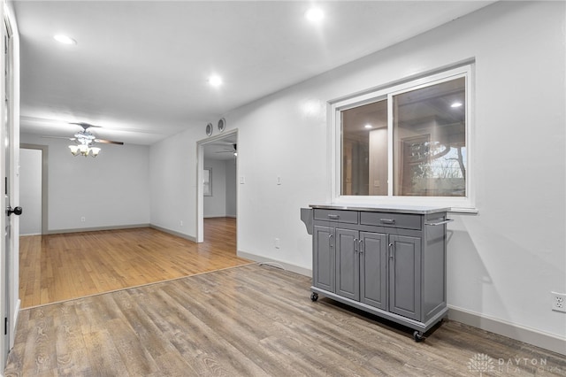 interior space with ceiling fan and light wood-type flooring