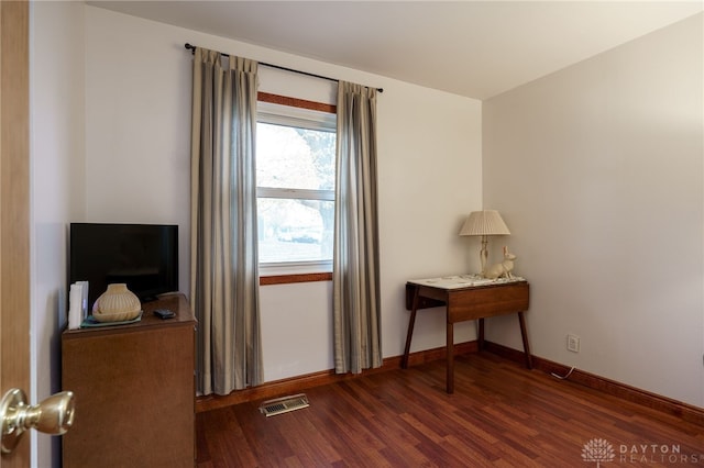 interior space with dark hardwood / wood-style floors