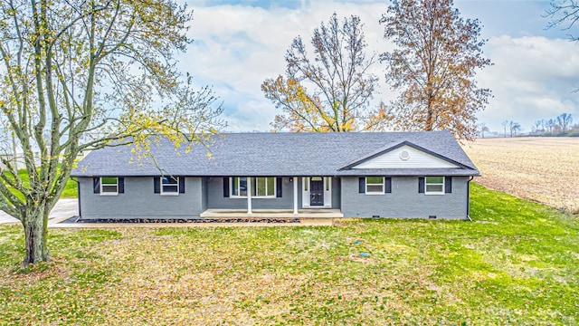 ranch-style home with a porch and a front lawn