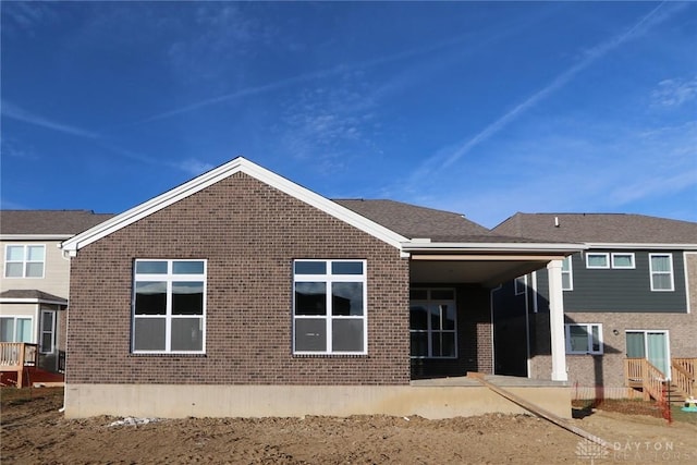 rear view of house featuring a patio area