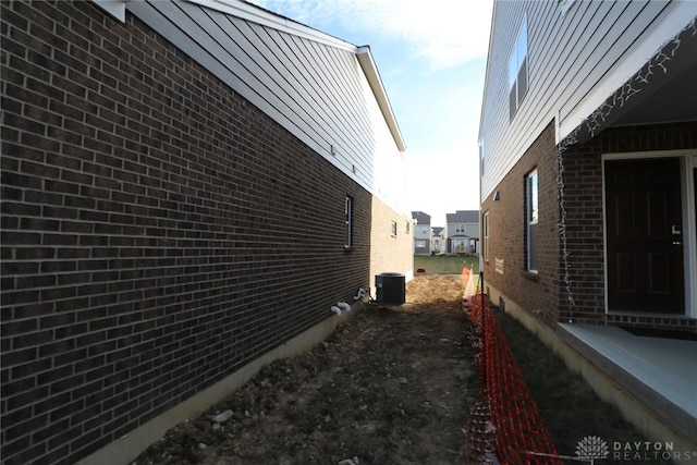 view of home's exterior featuring central AC