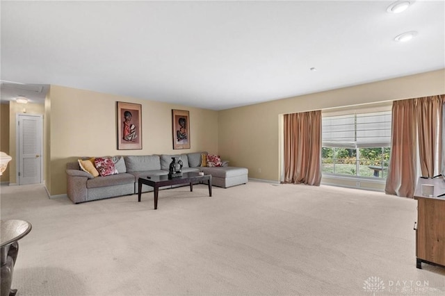 living room featuring light carpet