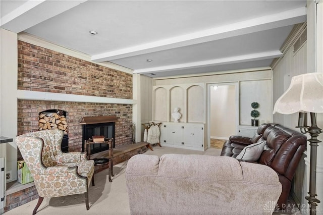 carpeted living room with beamed ceiling, a fireplace, ornamental molding, and brick wall