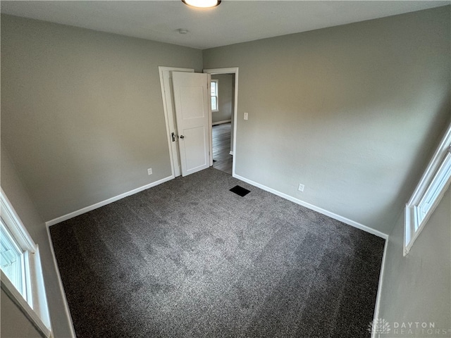 unfurnished bedroom with carpet flooring