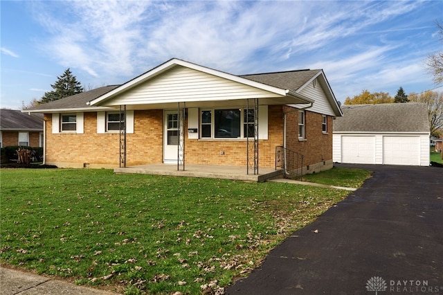 view of front of home with an outdoor structure, a front lawn, a porch, and a garage