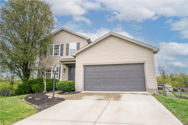 view of front of property with a garage