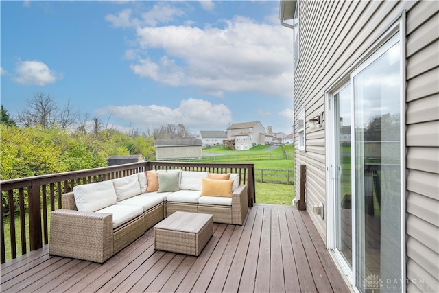 wooden deck featuring an outdoor living space