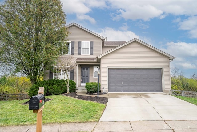 front of property featuring a garage and a front lawn