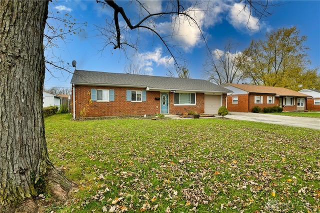 single story home with a garage and a front yard