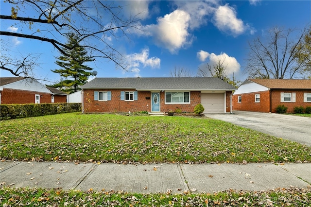 single story home featuring a front yard and a garage