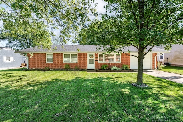 ranch-style house with a front yard and a garage