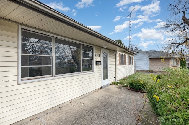 entrance to property with a patio area