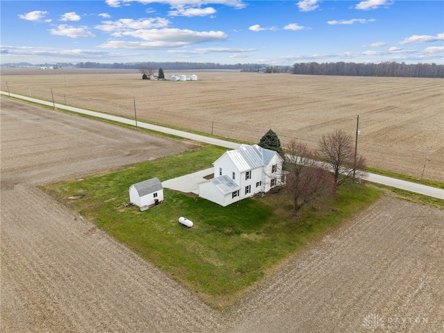 birds eye view of property featuring a rural view