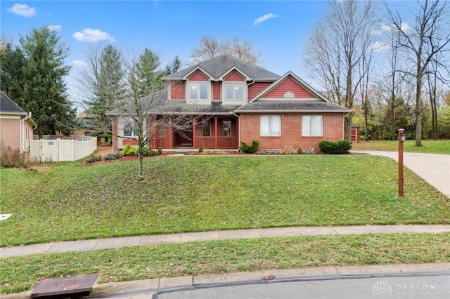 craftsman-style house with a front lawn