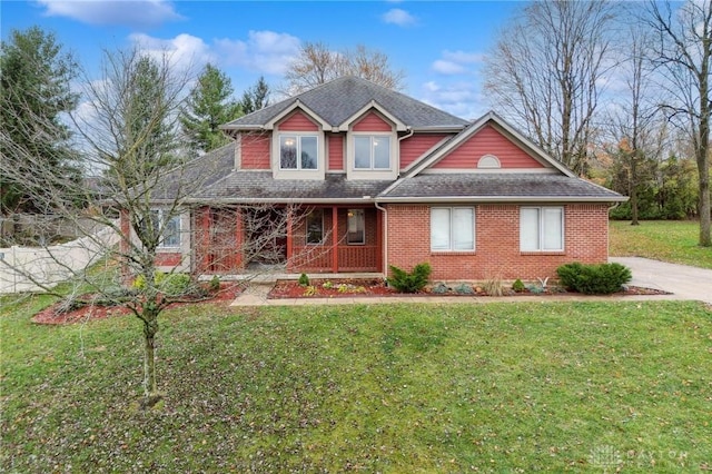 view of front of house featuring a front lawn and a porch