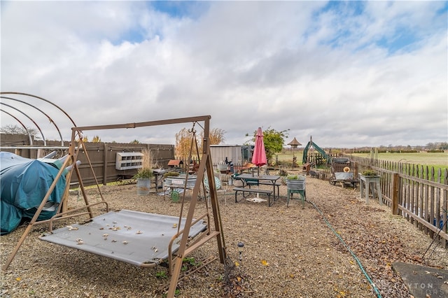 view of play area with an outbuilding