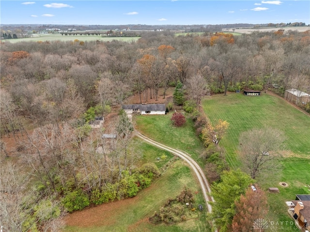 birds eye view of property with a rural view