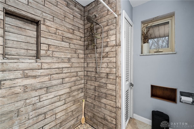 bathroom with tiled shower