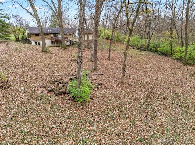 view of yard featuring a wooden deck