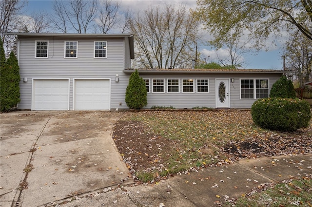 front of property with a garage