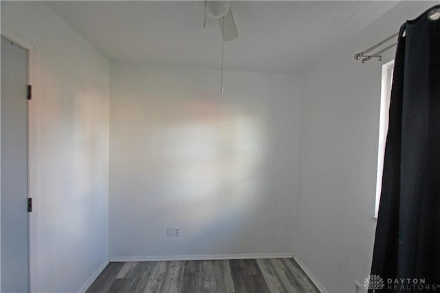 empty room featuring dark hardwood / wood-style floors