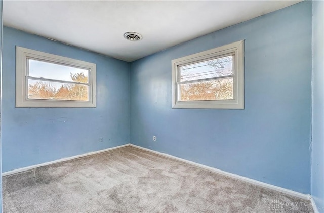 view of carpeted spare room