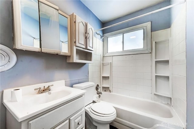 full bathroom with shower / bathing tub combination, vanity, and toilet