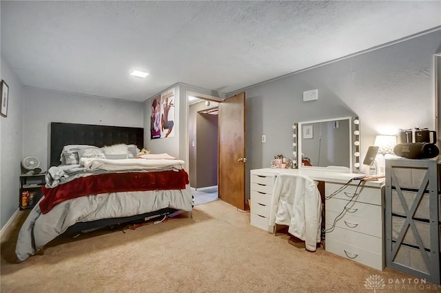 carpeted bedroom with a textured ceiling