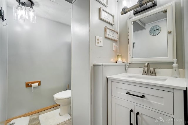 bathroom with vanity and toilet