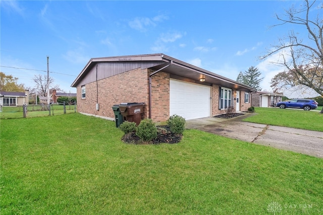 view of property exterior with a lawn and a garage