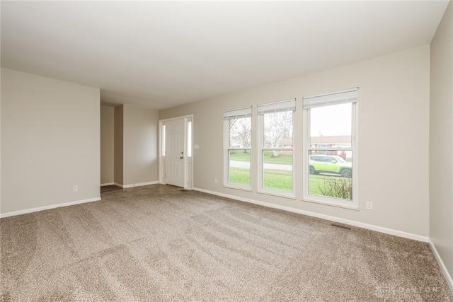 spare room with carpet