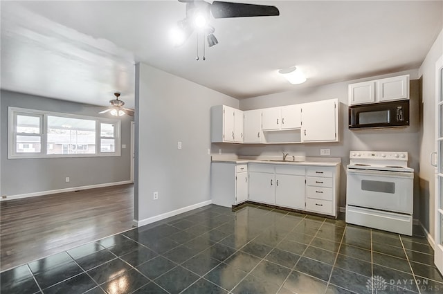 kitchen with white cabinetry, dark hardwood / wood-style flooring, white electric range, and sink