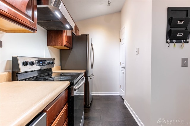 kitchen featuring dark tile patterned flooring, vaulted ceiling, extractor fan, and stainless steel electric stove