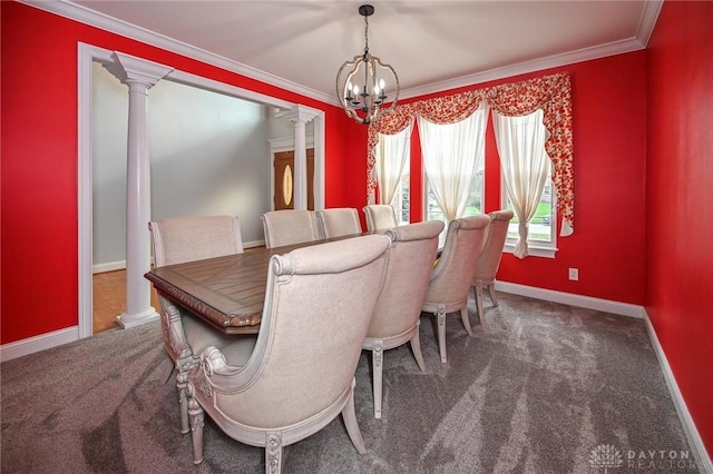 carpeted dining area featuring a notable chandelier, ornamental molding, and ornate columns