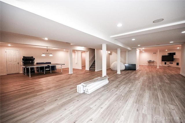 basement featuring wood-type flooring