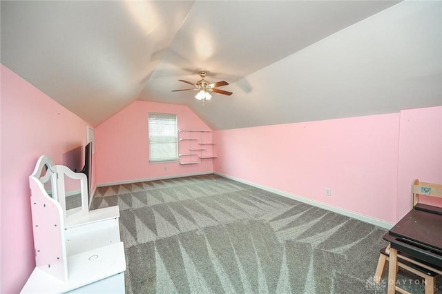 bonus room featuring lofted ceiling, ceiling fan, and carpet flooring