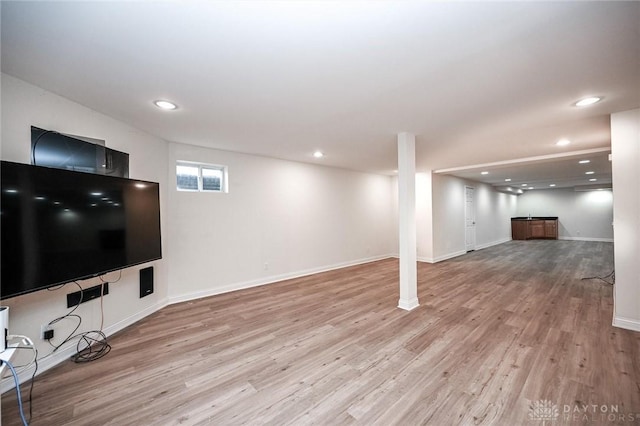 basement with light wood-type flooring