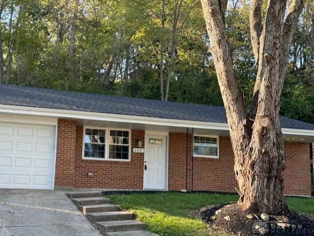 single story home featuring a garage