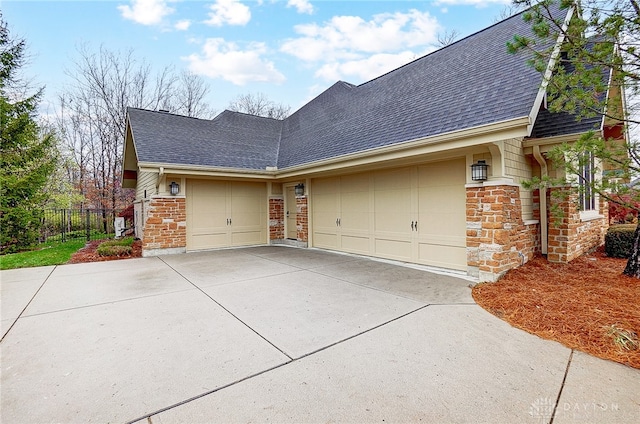 view of side of home with a garage