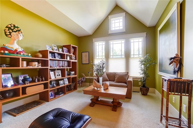 living area with carpet flooring and lofted ceiling