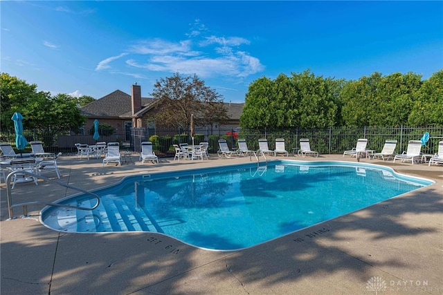 view of pool featuring a patio