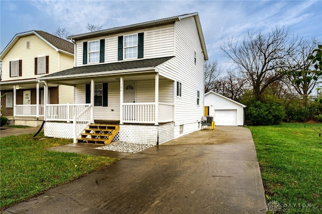 view of front of home featuring a porch, a garage, an outdoor structure, and a front yard