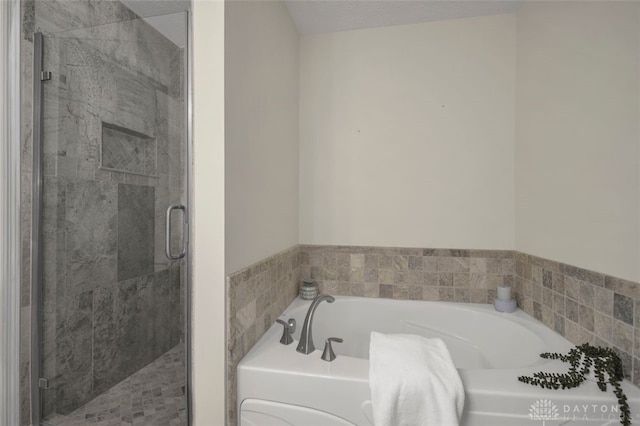 bathroom with independent shower and bath