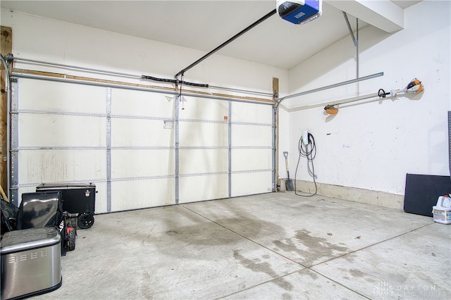 garage featuring a garage door opener