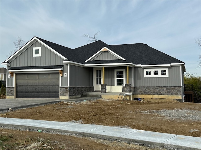 craftsman inspired home featuring a garage