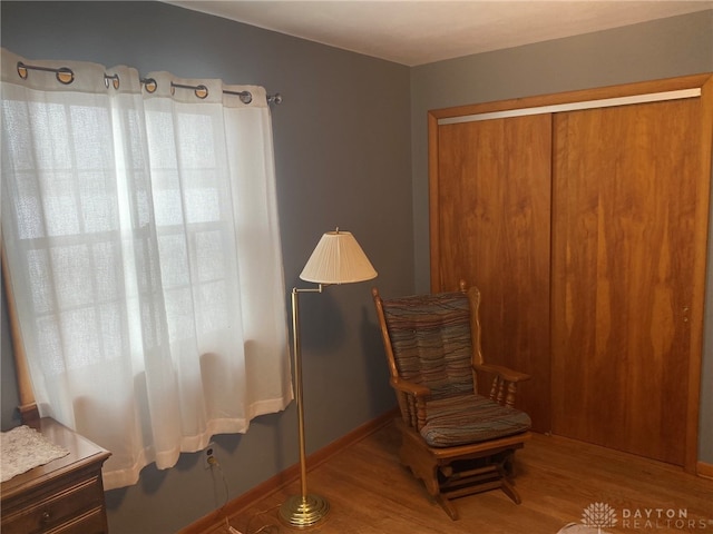 living area featuring hardwood / wood-style floors