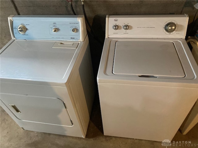 washroom with independent washer and dryer